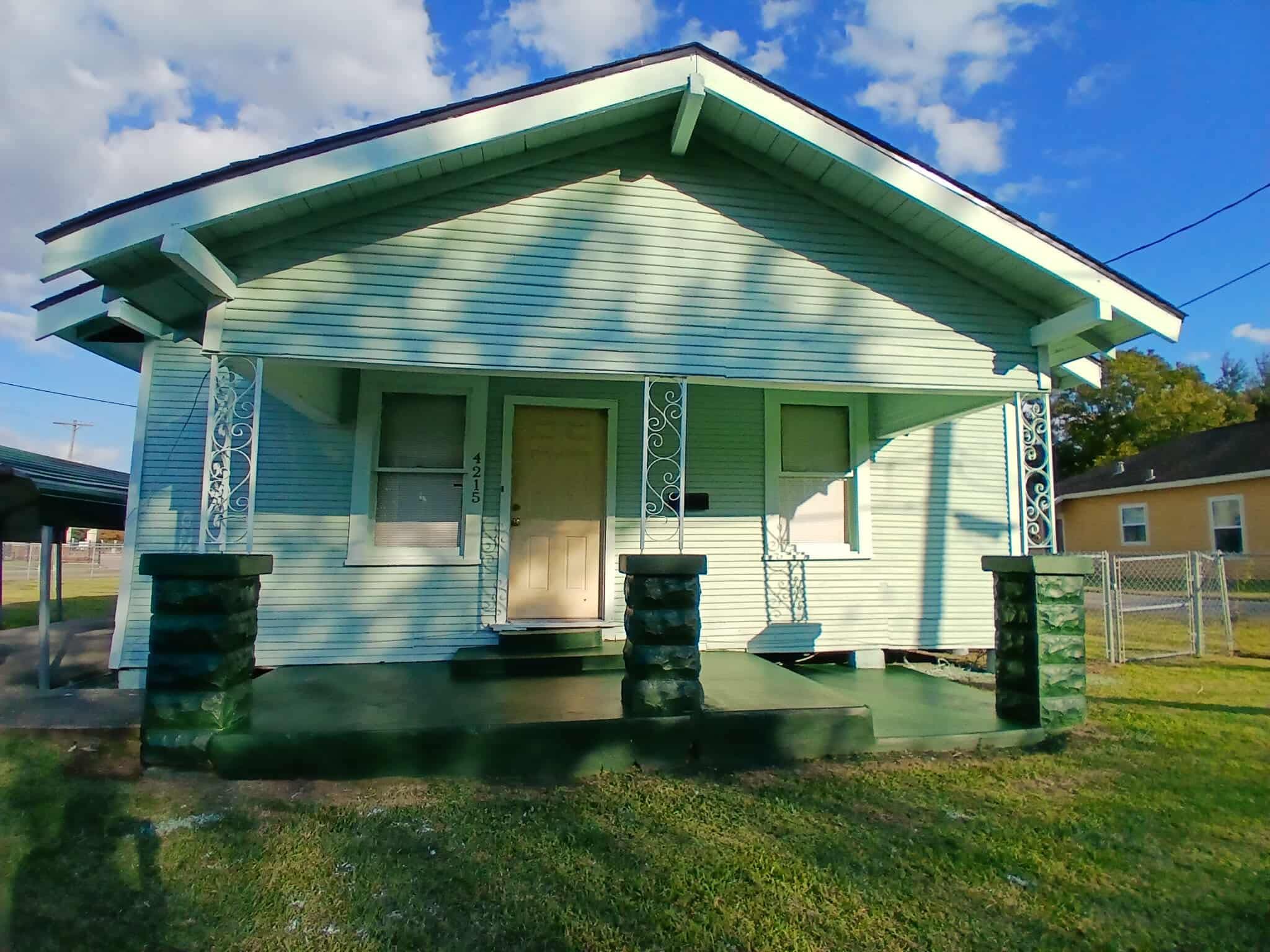 Exterior house painting completed by Krown Roofing and Construction